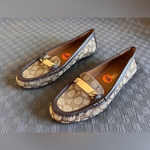 Coach moccasins. New with tag. Never worn.